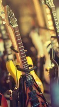 Scaricare immagine Guitars,Music,Objects sul telefono gratis.