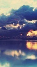 Scaricare immagine Cities, Sea, Sky, Clouds, Landscape, Sunset sul telefono gratis.