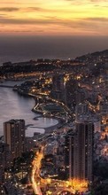 Scaricare immagine Cities, Sea, Landscape, Sunset sul telefono gratis.