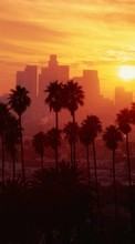 Scaricare immagine Cities, Palms, Landscape, Sunset sul telefono gratis.