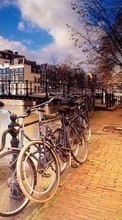 Scaricare immagine Cities, Landscape, Transport, Streets, Bicycles sul telefono gratis.