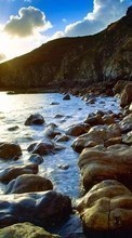 Scaricare immagine Landscape, Stones, Mountains, Sea, Sun sul telefono gratis.