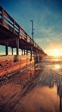 Scaricare immagine Landscape, Bridges, Sunset, Sea, Sun sul telefono gratis.