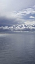 Scaricare immagine Sea, Clouds, Landscape sul telefono gratis.
