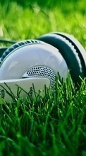 Scaricare immagine Music, Headphones, Objects, Grass sul telefono gratis.