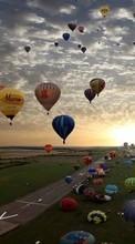 Scaricare immagine Sky, Clouds, Landscape, Balloons, Sunset sul telefono gratis.