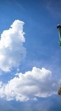 Scaricare immagine Clouds, Landscape, Statue of Liberty sul telefono gratis.