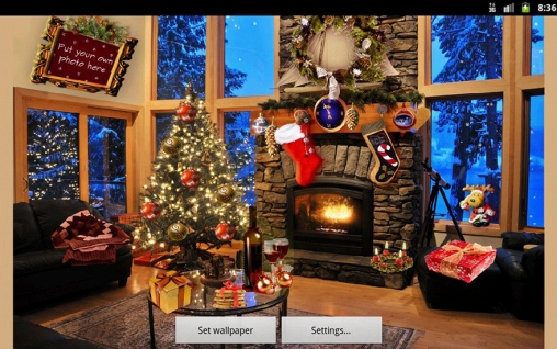 Screenshot dello Schermo Christmas fireplace sul cellulare e tablet.