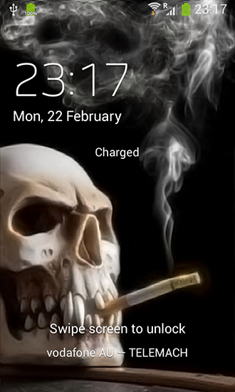 Screenshot dello Schermo Smoking skull sul cellulare e tablet.