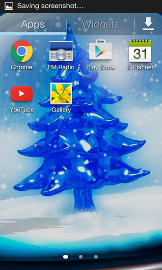Screenshot dello Schermo Snowy Christmas tree HD sul cellulare e tablet.